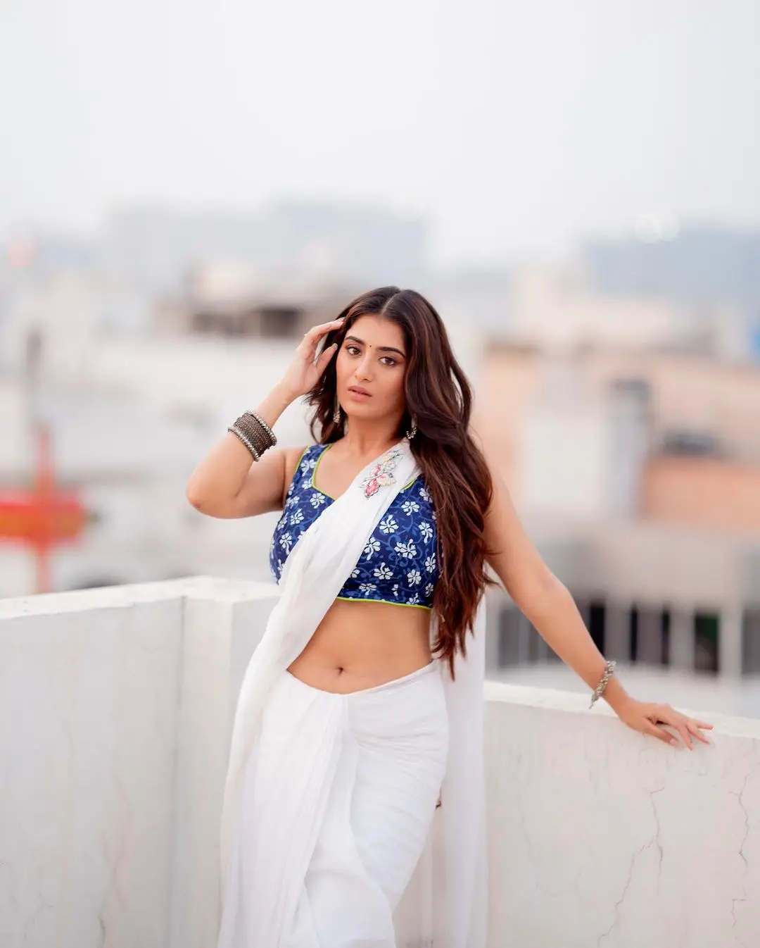 Rashi Singh in White Saree Blue Sleeveless Blouse